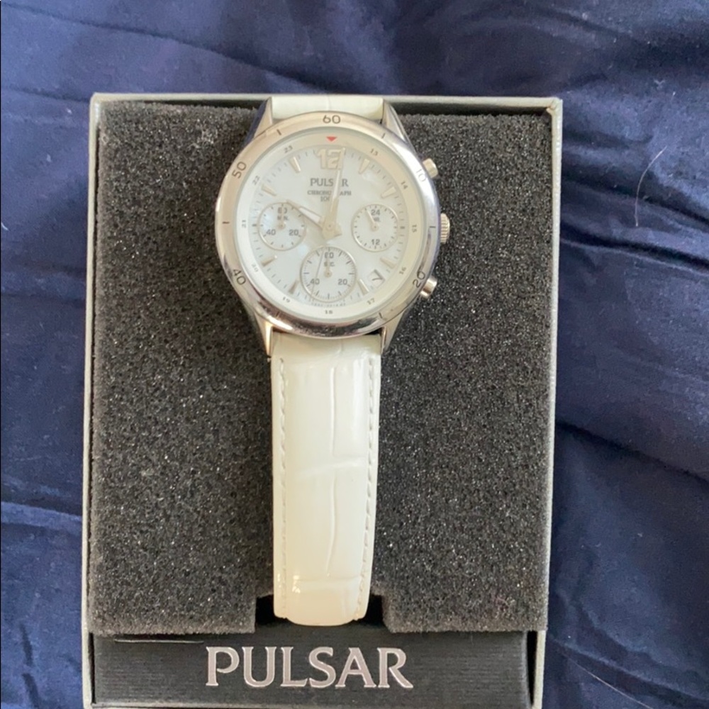white pulsar watch